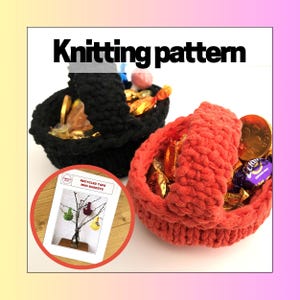 May include: A knitting pattern for recycled tape mini baskets featuring a black basket and a coral basket, both filled with assorted wrapped candies. The pattern document shows images of baskets hanging on branches with the text Recycled Tape Mini Baskets.