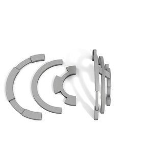 May include: A set of gray metal gears, some in a circular shape and others in a linear shape.