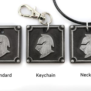 May include: Three silver-toned metal pendants with a knight's helmet design. The pendants are shown in three different styles: standard, keychain, and necklace.