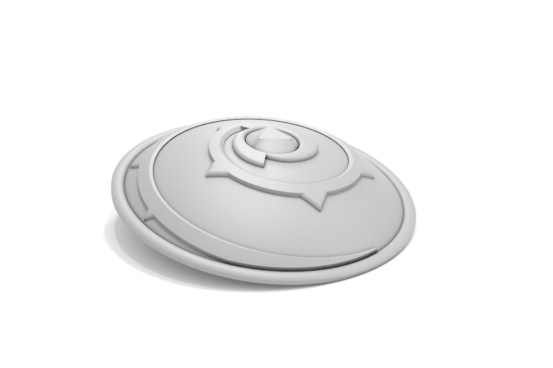 Puede incluir: Un objeto decorativo blanco circular con un dise&ntilde;o geom&eacute;trico conc&eacute;ntrico en relieve. El objeto tiene un acabado liso y brillante.