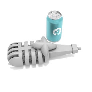 May include: A white microphone with a silver grill and a blue can of soda. The microphone is lying on its side with the can standing upright next to it.