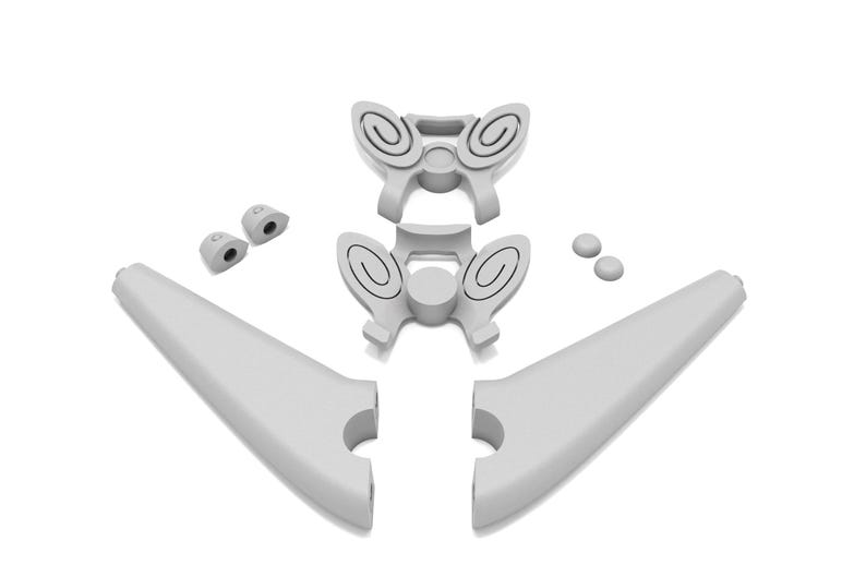 Puede incluir: Un conjunto de piezas de pl&aacute;stico gris para ensamblar un modelo de avi&oacute;n. Las piezas incluyen dos secciones de alas, una secci&oacute;n de cola y una secci&oacute;n central del fuselaje.