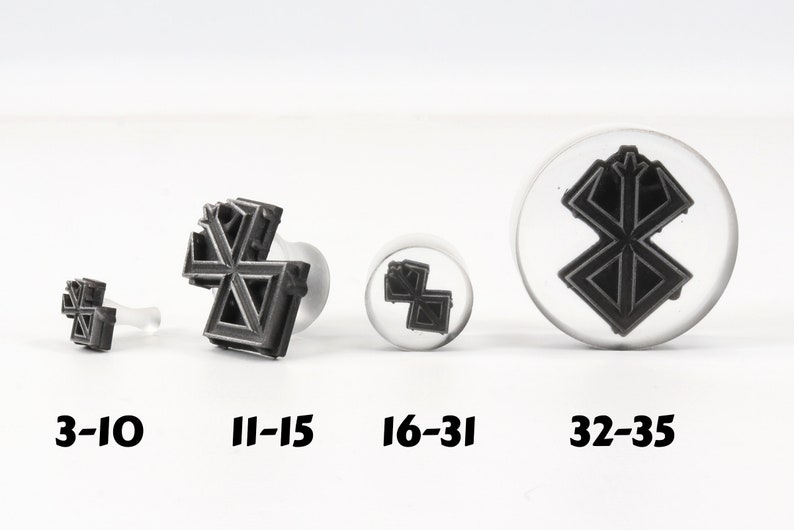 May include: Four different sizes of black and white rubber stamps with a geometric design. The sizes are labeled 3-10, 11-15, 16-31, and 32-35.