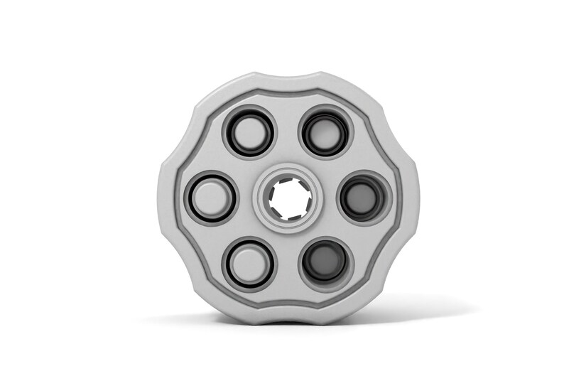 May include: A close-up of a silver revolver cylinder with six empty chambers.