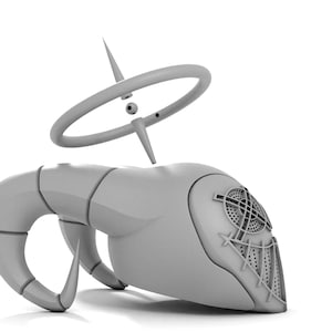 Puede incluir: Una escultura abstracta gris, impresa en 3D, con un anillo en la parte superior y un dise&ntilde;o geom&eacute;trico detallado en el lateral.