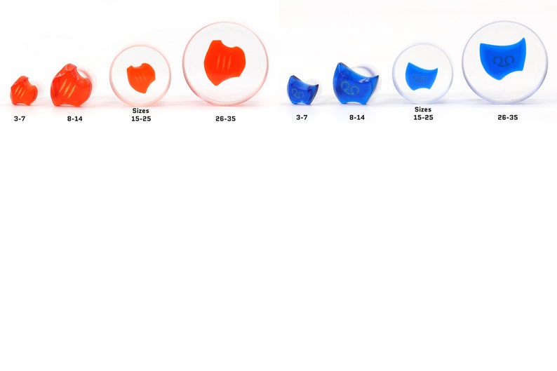 May include: Four sizes of clear glass ear gauges with a red or blue swirl design. The sizes are 3-7, 8-14, 15-25, and 26-35.