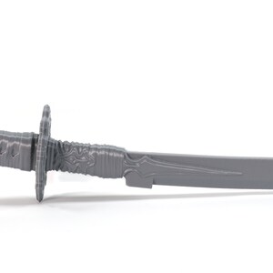 May include: A gray plastic katana sword with a detailed handle and a sharp blade.