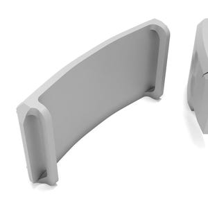May include: Two light gray, curved architectural elements are displayed against a white background. Each element has a rectangular shape with a curved top and a recessed section on one end. The design is minimalist and modern.