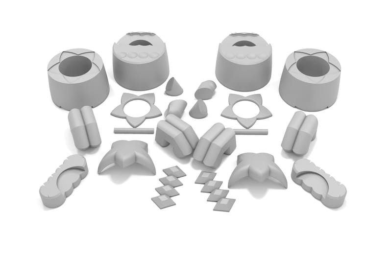 May include: A set of gray plastic toy building blocks with various shapes, including stars, circles, and rectangles.