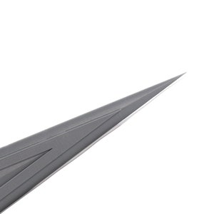 May include: Close-up of the sharp, pointed tip of a gray knife blade.