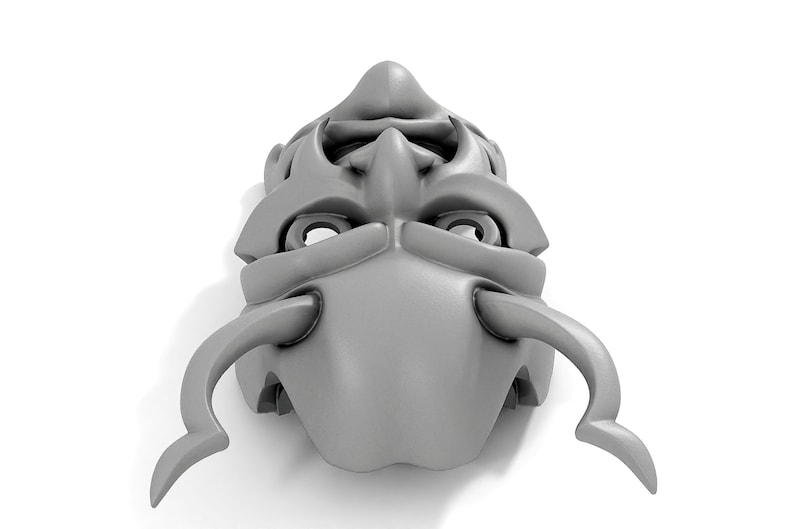 May include: A gray, detailed, 3D printed mask with horns and a stylized face. The mask has two large, round eye holes and a curved, pointed nose.