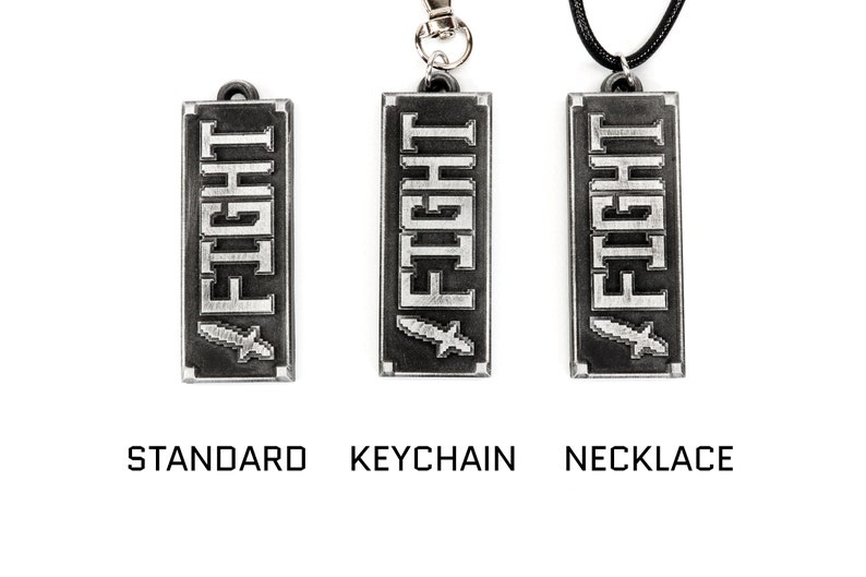 May include: A silver pendant with the word "FIGHT" in a pixelated font and a small sword graphic. The pendant is shown in three variations: standard, keychain, and necklace.