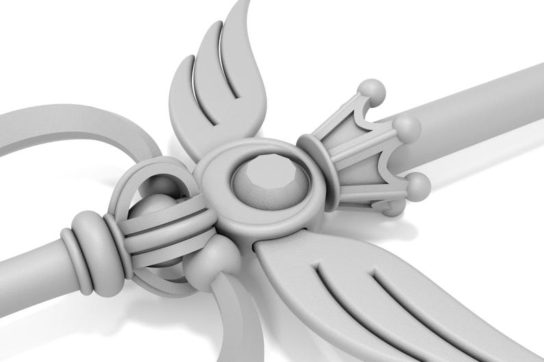 May include: A white plastic wand with a crown, wings, and a circular gem at the top. The wand is a decorative prop.