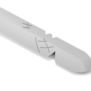 May include: A close-up of a silver metal tool with a pointed tip and a series of crosshatch markings on the side.