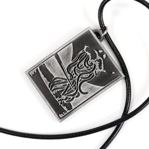 May include: A silver pendant necklace with a black cord. The pendant features a detailed image of a creature with tentacles.