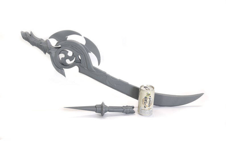 May include: A gray plastic sword with a curved blade and intricate details. The sword is about 30 inches long and has a smaller gray plastic dagger next to it. A can of beverage is included for scale.