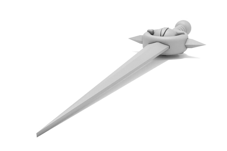 May include: A white, stylized dagger with a pointed tip and a decorative handle with a circular design and four spikes.