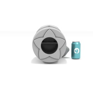 May include: A white, star-shaped weight with a black center hole. The weight is next to a blue can with a white logo.