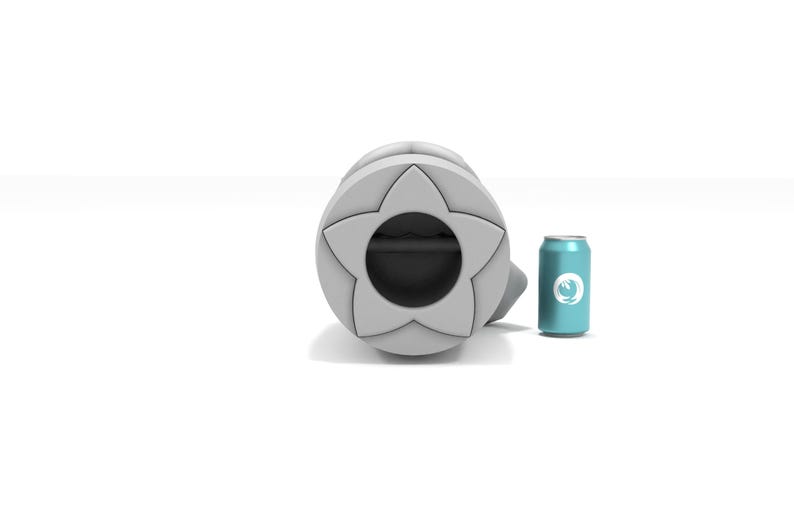 May include: A white, star-shaped weight with a black center hole. The weight is next to a blue can with a white logo.