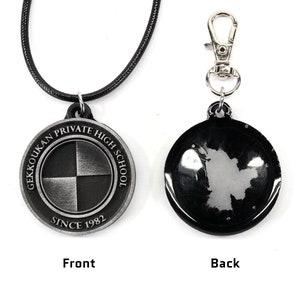 May include: A black and silver necklace with a round pendant featuring the text "Gekkoukan Private High School Since 1982". The pendant has a black and white checkered design. The back of the pendant is black and has a silver design.