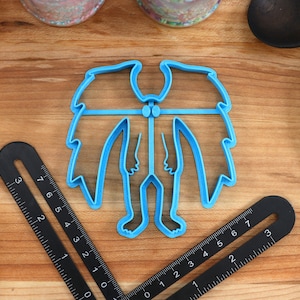 Cortadores de galletas de Cryptid: Sasquatch, Mothman, Lago Ness, Chupacabra Mothman Creeping