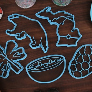 Michigan Cookie Cutters - Cereal Bowl, Dwarf Lake Iris, Michigan State Outline, Petoskey Stone, Wolverine Animal - MI Gift Idea