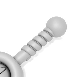 May include: A close-up of a gray, plastic sword with a round, bulbous handle. The handle has a textured, spiral design.