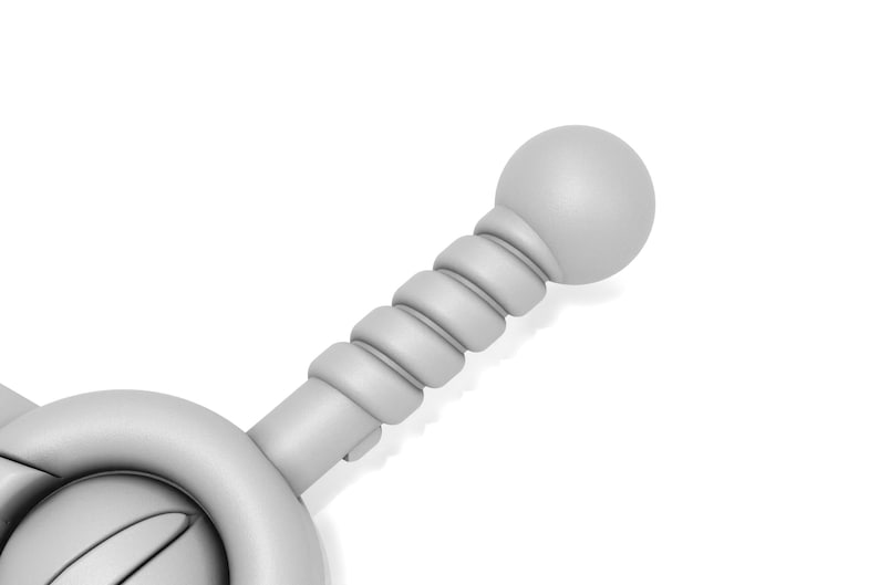 May include: A close-up of a gray, plastic sword with a round, bulbous handle. The handle has a textured, spiral design.