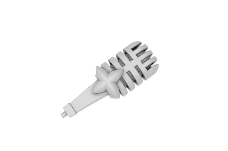 May include: A white microphone with a star-shaped design on the handle.