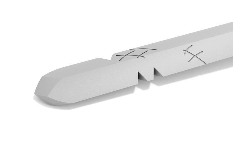 May include: A close-up of a silver-colored, broken, metal rod with a pointed tip. The rod has a series of small, evenly spaced, horizontal cuts along its length.