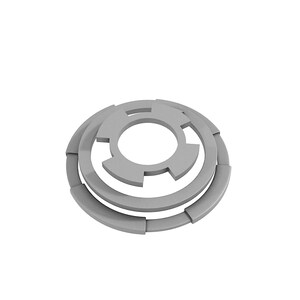 May include: A silver metal washer with a circular shape and a series of concentric rings. The washer has a central hole and a series of cutouts around the outer edge.