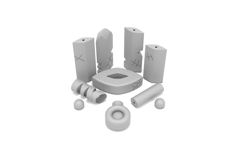 May include: A set of gray, geometric shapes, including a cylinder, a sphere, a spiral, and a flat, oval-shaped piece with a hole in the center.