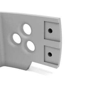 May include: A light gray, angular architectural component with three circular indentations and two square holes. The object has a curved edge and appears to be made of a solid, possibly manufactured, material. The design is minimalist and modern.