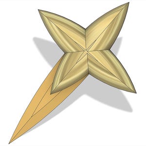 May include: A gold-colored, four-pointed star with a long, thin, pointed tail. The star is made of a material that appears to be wood or metal.