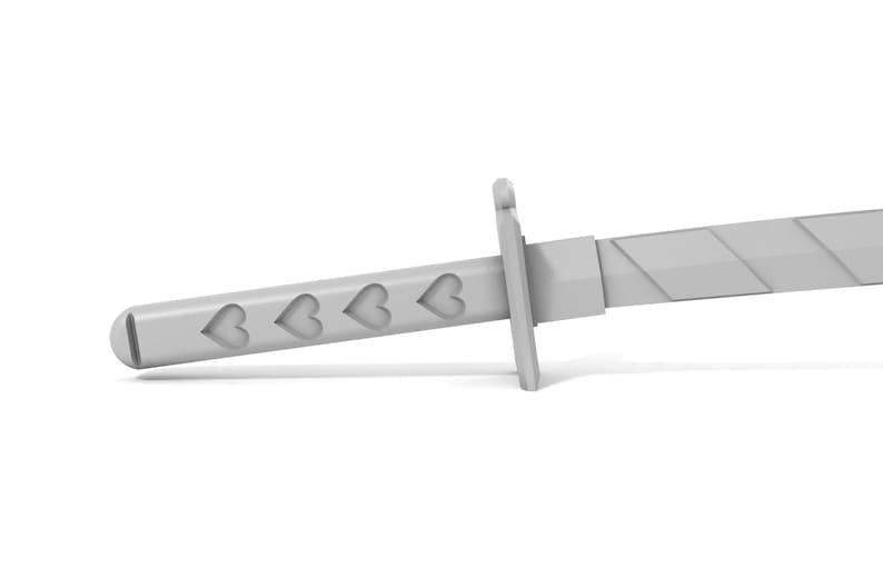 May include: A gray plastic toy sword with a handle decorated with four heart shapes.