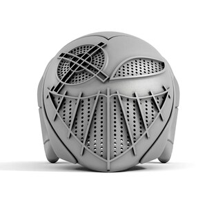 Puede incluir: Un casco gris impreso en 3D con un dise&ntilde;o geom&eacute;trico y una m&aacute;scara facial perforada.