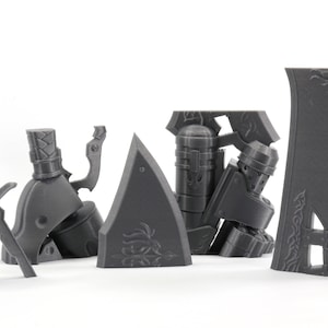 May include: A set of gray 3D printed plastic pieces for a model kit. The pieces include a figure, a weapon, and a shield.