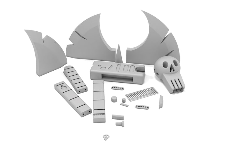 Puede incluir: Un kit de modelo impreso en 3D de un cr&aacute;neo con una gran estructura en forma de ala segmentada. El kit incluye una variedad de piezas, incluyendo un cr&aacute;neo, alas y una peque&ntilde;a caja rectangular.