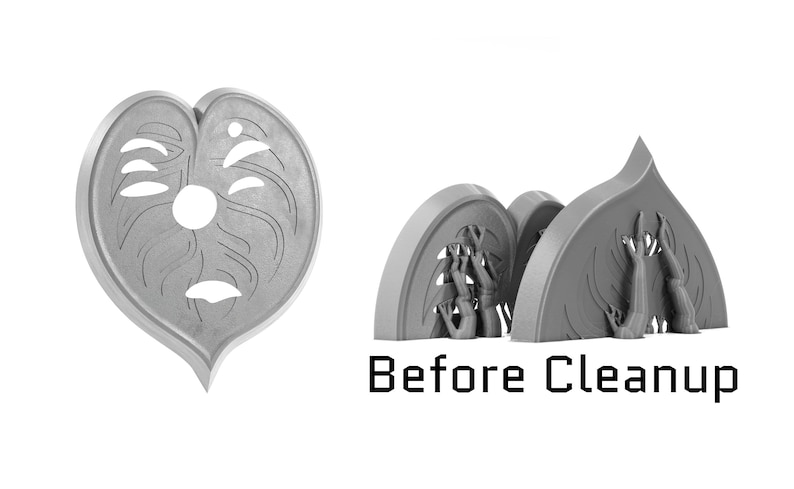 May include: A 3D printed model of a heart-shaped object with a face carved into it. The model is unfinished and has rough edges. The text "Before Cleanup" is visible below the model.