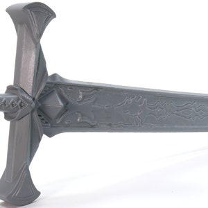 May include: A gray metal sword with a detailed design on the blade and a cross-shaped hilt.