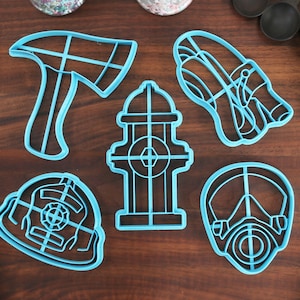 Koekjes uitsteekvormpjes brandweerman - brandkraan, brandweerhelm, huurslang, gasmasker, brandweerbijl - EMT-cadeau