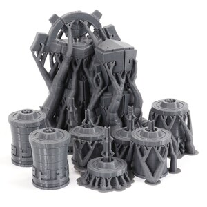May include: A set of 3D printed gray plastic miniature buildings with intricate details. The buildings are designed with a futuristic, sci-fi aesthetic.