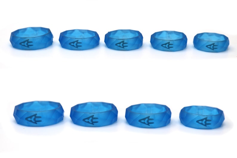 May include: Ten blue silicone rings with a geometric design and a small logo in the center.