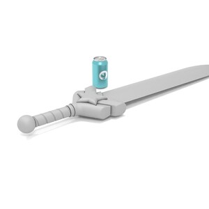 May include: A light gray toy sword with a star-shaped crossguard and a cylindrical handle. A teal can with a white logo is placed near the sword. The sword is approximately 30 inches long.