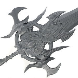 May include: A gray, intricately detailed sword with a long, curved blade and a complex, ornate hilt. The hilt features a central, circular design with a raised eye and intricate, flowing patterns.