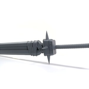 May include: A grey, metal sword with a spiked handle and a long, straight blade. The blade is wrapped in a band of metal.