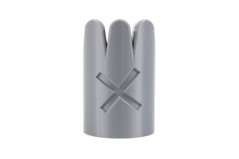 May include: A gray plastic chess piece with a crown and a cross on the top. The piece is designed to be used in a game of chess.