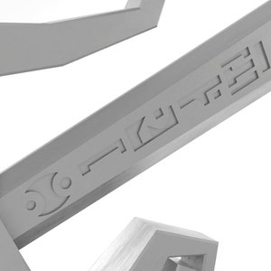 May include: A silver-coloured metal sword with a decorative design and the text "SKY-HIGH" engraved on the blade.