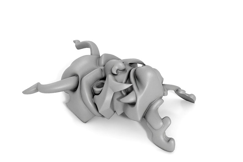 May include: A gray, detailed, 3D printed model of a stylized face with horns and a large open mouth.