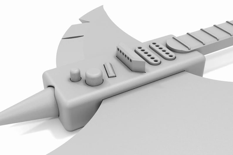 Puede incluir: Una guitarra el&eacute;ctrica gris en forma de hacha con una punta puntiaguda y una hoja grande y plana. La guitarra tiene un dise&ntilde;o tradicional con un diapas&oacute;n, perillas y un selector de pastillas.